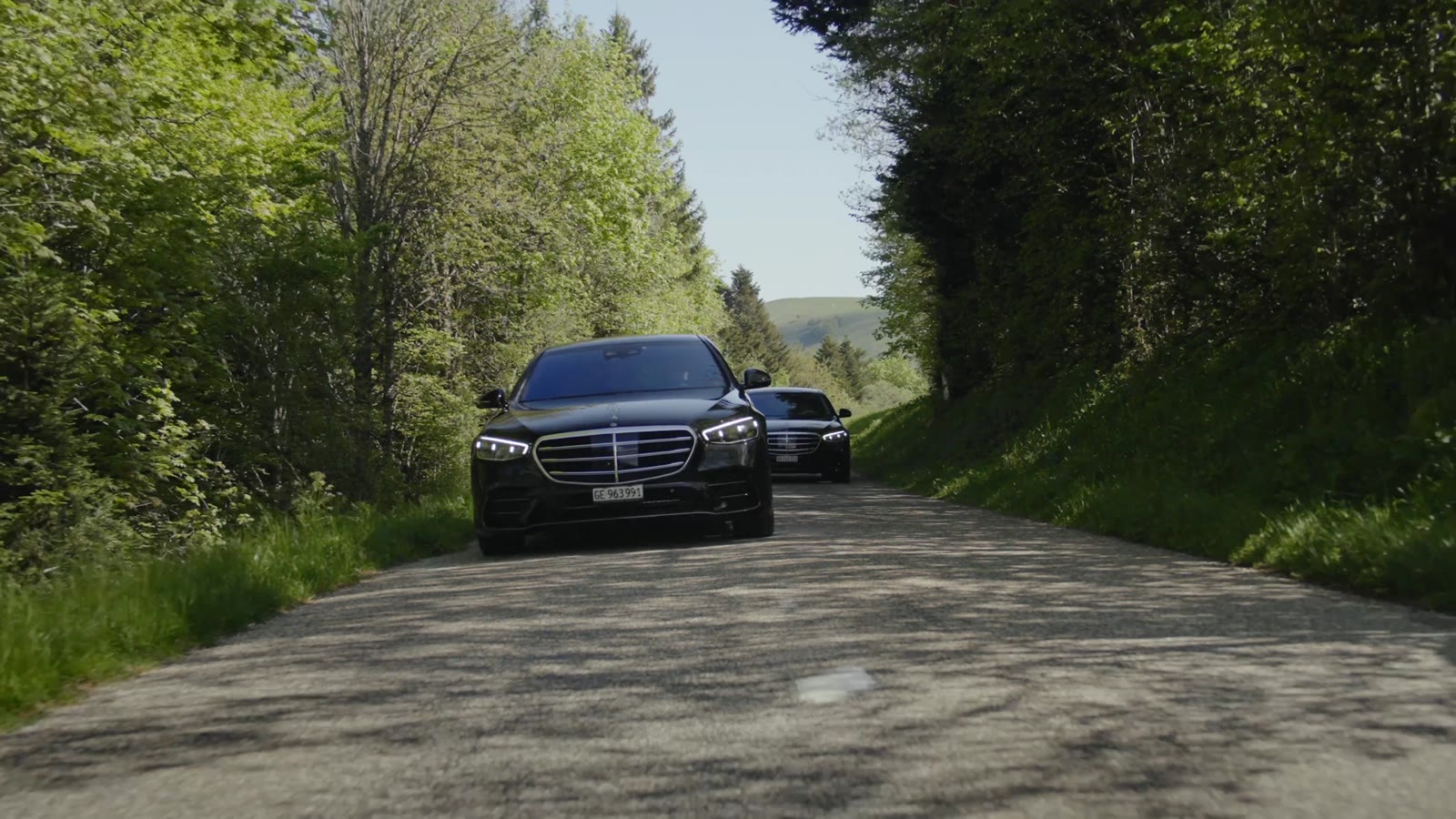 Phenom Services Mercedes S-Class on a Swiss country road — the route to Davos