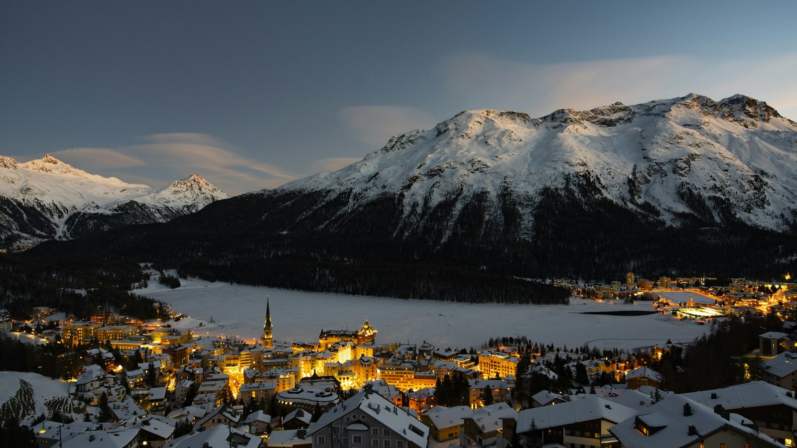 St. Moritz under snow at dusk — the Engadin in winter